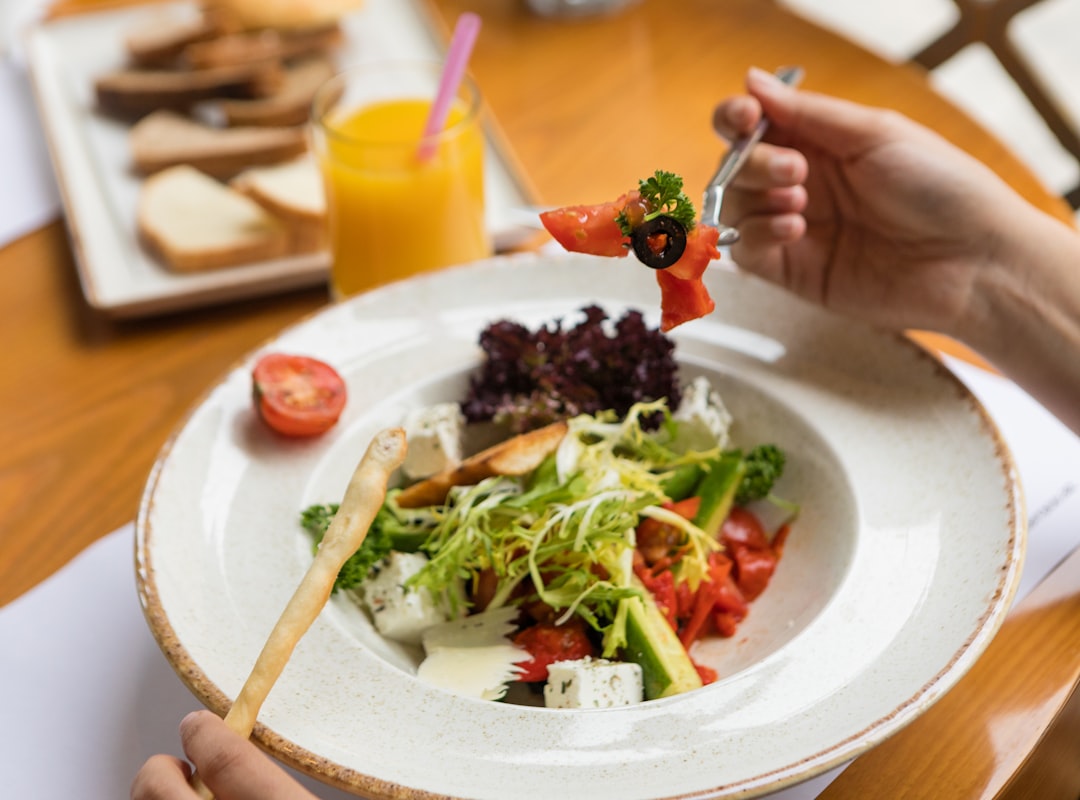 Woman preparing healthy meal with fresh vegetables